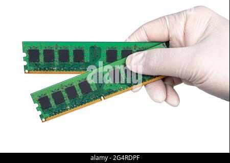 holding ram memory wearing white gloves on white background Stock Photo