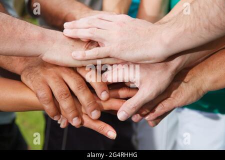 Closeup of human hands showing unity Stock Photo