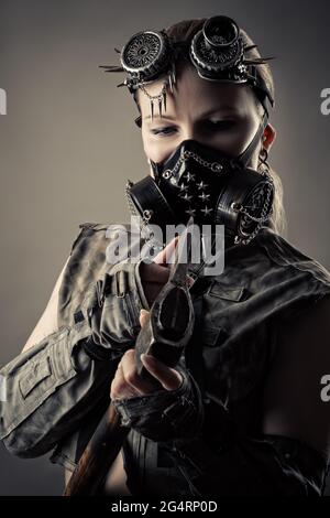 brutal woman with axe and steampunk mask in neon light Stock Photo - Alamy