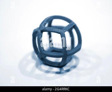 Abstract object printed by 3d printer on white background. Stock Photo