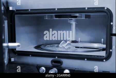Object printed from metal powder on metal 3d printer, working chamber. Stock Photo