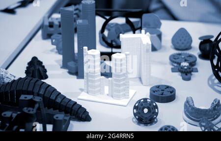Many abstract models printed by 3d printer close-up. Stock Photo