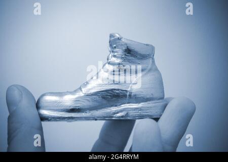Object in the form of a boot printed on a 3d printer and covered with enamel Stock Photo