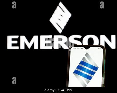 In this photo illustration, the Emerson Electric Co. logo seen ...