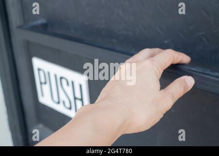 Black grunge door in loft room, stock photo Stock Photo