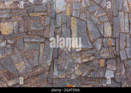 abstract flat texture and background of granite pieces mosaic. Stock Photo