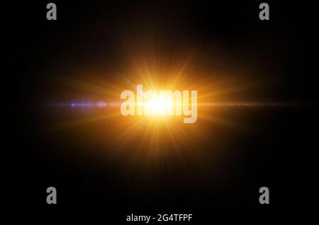 Sun isolated on black background. Glow light effect with flares, cosmic sunburst, star explosion isolated on black. Stock Photo