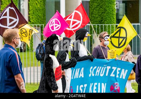 Berlin, Germany. 23rd June 2021. Protester protest for the climate before the federal chancellery in Berlin on the 23.06.2021. They protest for a better climate policy. Credit: Tim Eckert/Alamy Live News Stock Photo
