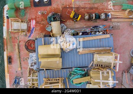 Aerial view floating cargo transportation by of barge the on a construction vessel in the building pipes Stock Photo