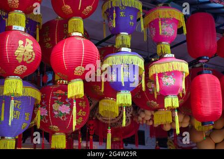 Chinese lanterns hanging up for sale on a street in Singapore Stock Photo