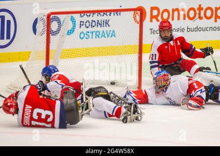 Ostrava, Czech Republic. 23rd June, 2021. L-R Para ice-hockey players Konstantin Shikhov (RUS), Martin Kudela (CZE), Evgeny Petrov (RUS) in action, during the World Championships Para Ice Hockey match Czech Republic vs. Russia in Ostrava, June 23, 2021. Credit: Vladimir Prycek/CTK Photo/Alamy Live News Stock Photo