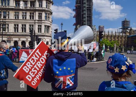 London, United Kingdom. 23rd June 2021. Anti-Brexit protesters gathered outside the Houses of Parliament on the fifth anniversary of the referendum. Stock Photo