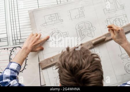 overhead view of graphic designer draw a graph Stock Photo