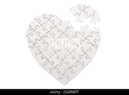 Empty heart shaped jigsaw puzzle isolated on white background Stock Photo