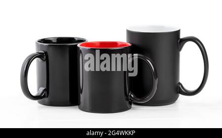 Set of three black cups isolated on white background Stock Photo
