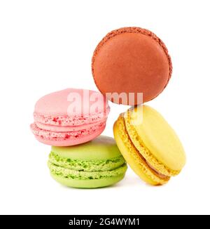 Fresh macaroons isolated on white background. Sweet and colourful french macaron. Stock Photo
