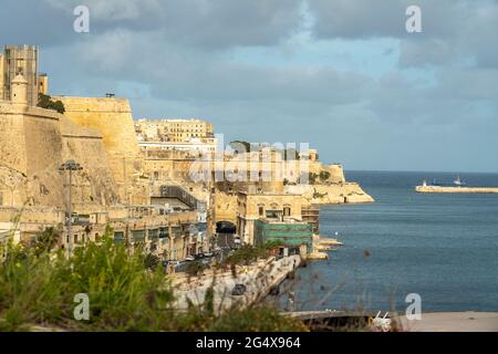 Malta, South Eastern Region, Valletta, View of Mediterranean SeaÂ and fortified walls of historical city Stock Photo