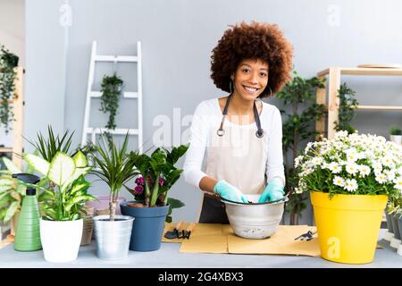 Smiling Flower Shop Owner Stock Photo - Alamy