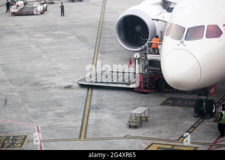 Delhi, India. 15th December 2014. Passenger commercial aircraft at airport, view of the cockpit. Stock Photo