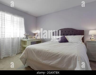 Modern residential bedroom interior Stock Photo
