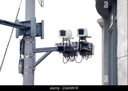 video surveillance camera mounted on a pole Stock Photo
