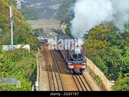 The Cathedrals Express enthusiast train crossing St Levan’s Viaduct in Devonport. Train pulled by the Princess Elizabeth 6201. Stock Photo