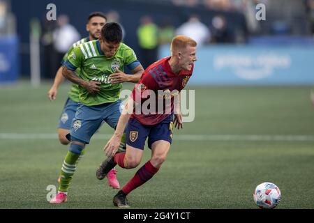 Seattle Sounders forward Raul Ruidiaz (9) reacts to an accidental shot to the face from Real Salt Lake defender Justen Glad (15) during the first half Stock Photo