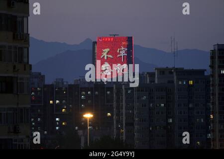 June 24, 2021, Beijing, Beijing, China: Recently, a grand ''light show'' was opened at many important nodes in Beijing to celebrate the 100th anniversary of the founding of the Communist Party of China.The places where the ''light show'' is opened include the North Canal, the sub-center of the city of Tongzhou District, No.1 Zhongguancun in Haidian District, the Badaling Great Wall in Yanqing District, and Yanqi Lake in Huairou District. The focus of this group of pictures is the grand ''light show'' of the Sinosteel Building in the core area of Zhongguancun. (Credit Image: © SIPA Asia via Z Stock Photo