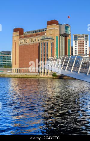 Gateshead Millennium Bridge and the BALTIC Centre for Contemporary Art in Gateshead. Created from a vast converted flour mill.