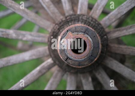 Very old and worn out cart wheel Stock Photo