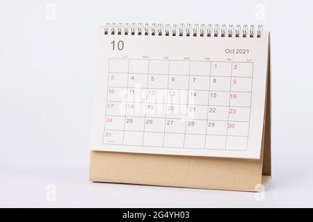 Page with dates of october is open on desk calendar closeup Stock Photo