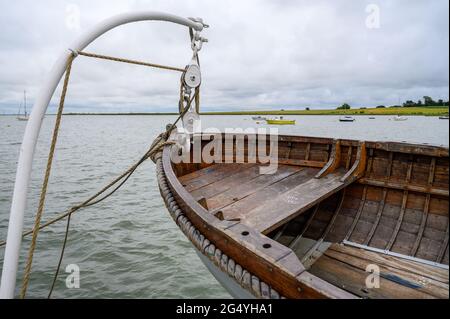 Looking out on the River Meway from 'Edith May' historic sailing barge with dinghy. Lower Halstow, Thames estuary, Kent, England. Stock Photo