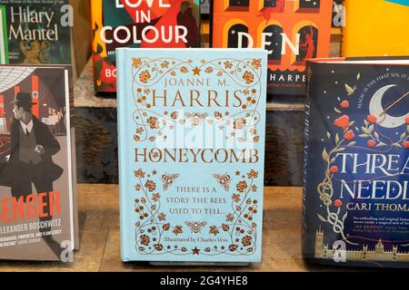 British author Joanne Harris Honeycomb front cover Waterstones book shop window display books in summer June 2021 London England UK KATHY DEWITT Stock Photo