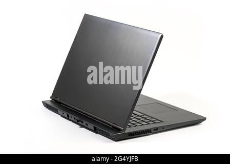 Large open Laptop  isolated on white background - Side view with clipping path Stock Photo
