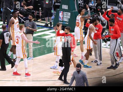 Milwaukee, USA. 24th June, 2021. The Atlanta Hawks celebrate as time expires in a 116-113 victory against the Milwaukee Bucks in Game 1 of the NBA Eastern Conference Finals on Wednesday, June 23, 2021, at the Fiserv Forum in Milwaukee. (Photo by Curtis Compton/Atlanta Journal-Constitution/TNS/Sipa USA) Credit: Sipa USA/Alamy Live News Stock Photo