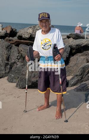 Posed portrait of a 95 year old immigrant from Russia out for his daily exercise walk on the beach. In Brighton Beach, Brooklyn, NY. Stock Photo