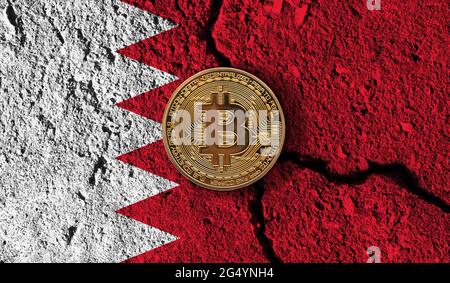 Bitcoin crypto currency coin with cracked Bahrain flag. Crypto restrictions Stock Photo