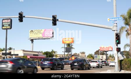 San Diego, California USA - 29 Nov 2020: Recreational cannabis advertisement billboard by road or highway. Selling of legalized marijuana or marihuana Stock Photo