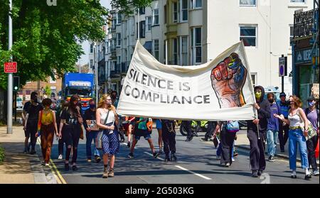 Brighton  UK 24th June 2021 - Kill the Bill protesters march through Brighton today as demonstrations take place to coincide with the House of Commons debate on the government's new Police, Crime, Sentencing and Courts bill.  : Credit Simon Dack / Alamy Live News