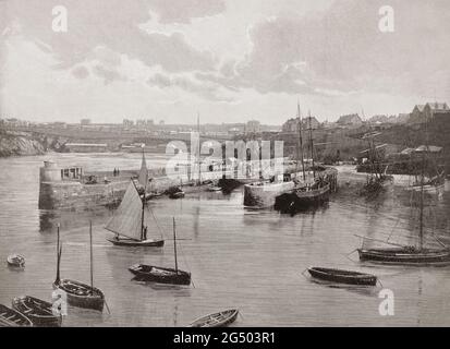 A late 19th century view of the harbour, built in the 1830s, in Newquay, a town on the north coast in Cornwall, in the south west of England. The fishing port and seaside resort on the North Atlantic coast of Cornwall, England is now a popular surfing centre. Stock Photo