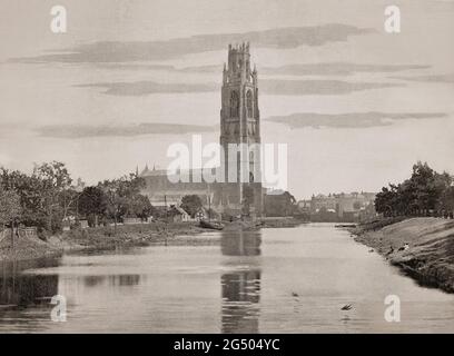 A late 19th century view of Boston Stump at the side of the River Witham in Boston, Lincolnshire, England. St Botolph's Church tower, 266 feet high, has been nicknamed the 'Boston Stump' since its construction in the perpendicular style that had become popular during much of the 15th century. The tower, topped with a highly decorated octagonal lantern ringed with pinnacles, with great views from the Wash has long been used as a landmark for sailors, and on a clear day can be seen from Norfolk. Stock Photo