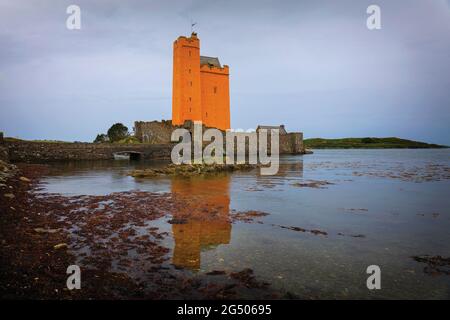 Kilcoe Castle, at Roaringwater Bay near Ballydehob, County Cork, Ireland.  The castle was originally built in the 15th century, and most recently rest Stock Photo