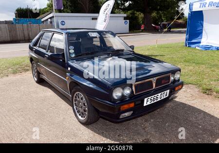Three-quarter front view of a  Blue, 1988, Lancia HE Integrale in the Lancia Motor Club Zone, of the 2017 Silverstone Classic Stock Photo