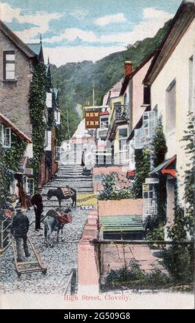 Antique postcard entitled “High Street, Clovelly”. Devon, England. Circa. 1905 Stock Photo