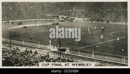 ‘Homeland Events’ W.D. & H.O. Wills cigarette card entitled, “Cup Final at Wembley”. “The Cup Final Ground at Wembley was formally opened in April, 1923. Our photo shows the Stadium while play was in progress between Birmingham and West Bromwich Albion. By winning the Cup and gaining promotion in the same season, the Albion performed a double event never previously recorded by any team”. Published in 1932.
