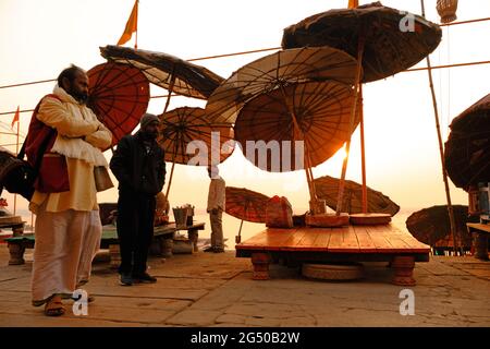 February 2, 2021, Morning view of holy ghats of Varanasi. Umprellas and beds on ghat Stock Photo