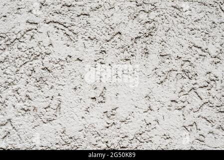 pattern of white plaster wall in rough structure Stock Photo