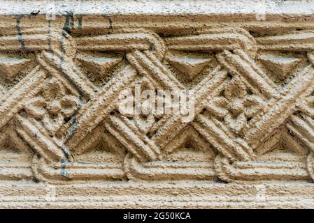 Elements of architectural decoration of buildings, plaster stucco, wall texture, plaster molding and patterns. Stock Photo