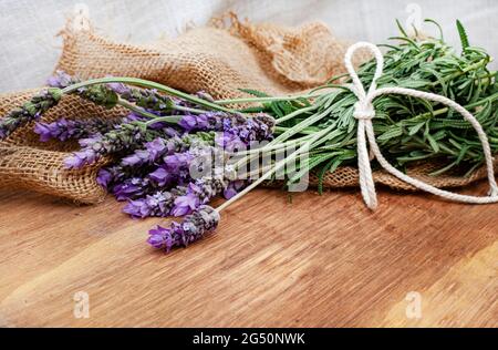 rustic table with bunch of fresh cut lavender floers Stock Photo