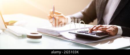 Accountant Working With Financial Data In The Office Stock Photo